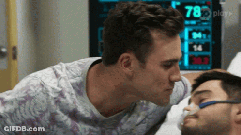 Man Kissing Another Man's Forehead At Monitor 78 GIF