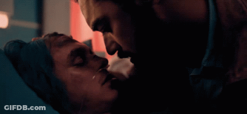 Man Kissing Another Man's Forehead GIF