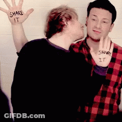 Man Kissing Another Man Saying Share It GIF