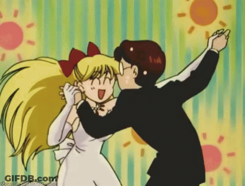 Man Kissing Girl On Cheek Obsessed With Sailor Moon GIF