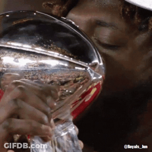 Man Kissing Trophy With @Royals_jun GIF