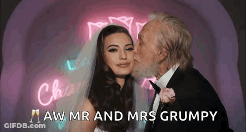Man Kissing Woman Cheek Aw Mr Mrs Grumpy GIF