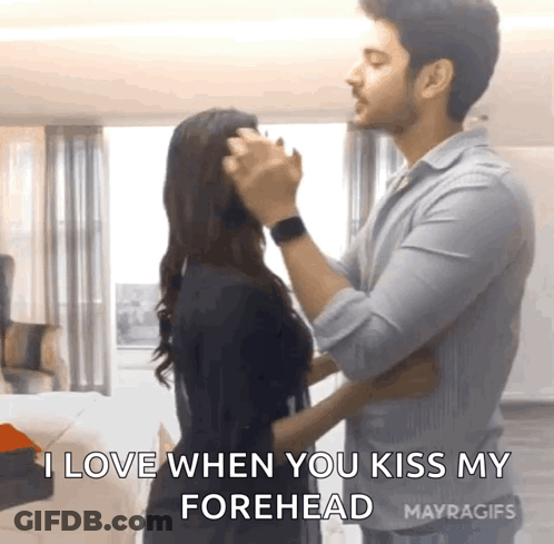 Man Kissing Woman Forehead Saying I Love When You Kiss My Forehead GIF