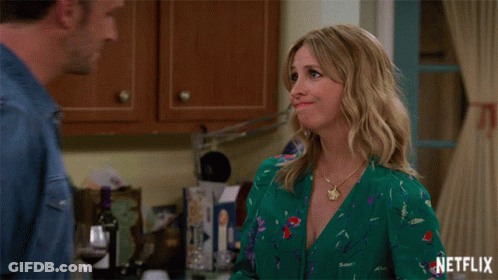 Man Kissing Woman Forehead With Netflix Logo GIF