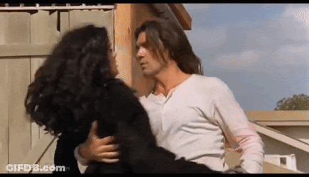 Man Kissing Woman GIF