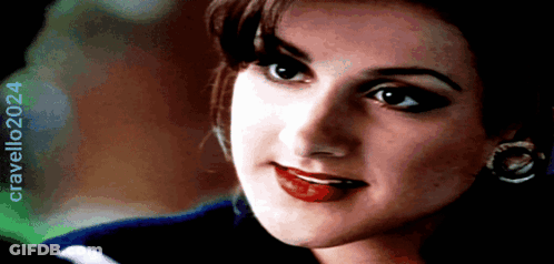 Man Kissing Woman On Cheek GIF