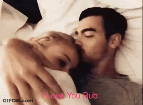 Man Kissing Woman On Cheek Saying I Love You Bub GIF