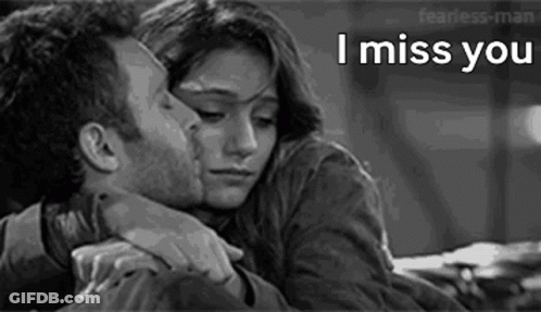 Man Kissing Woman On Forehead GIF