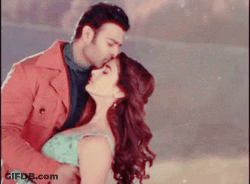 Man Kissing Woman On Forehead GIF