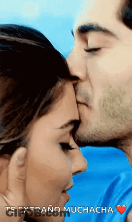 Man Kissing Woman On Forehead GIF