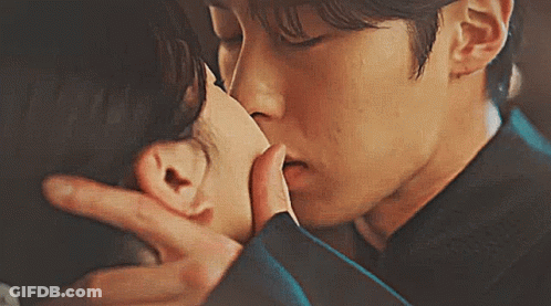 Man Kissing Woman On Forehead GIF