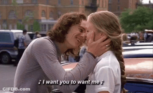 Man Kissing Woman On Forehead Saying I Want You To Want Me GIF