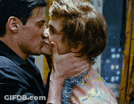 Man Kissing Woman On Neck Blurry Photo GIF