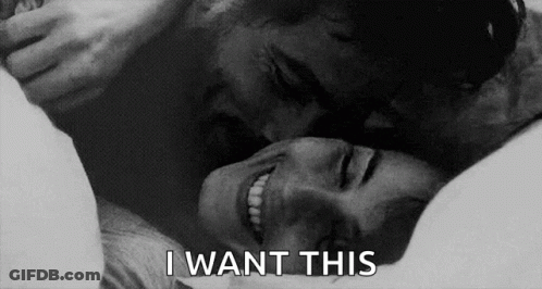 Man Kissing Woman On Neck GIF