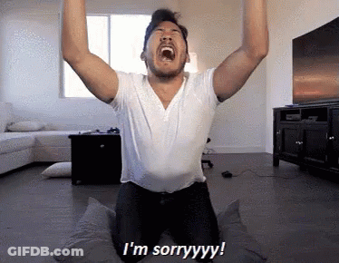 Man Kneeling Arms Up Saying I'm Sorry GIF