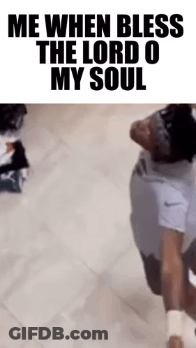 Man Kneeling Before Bless The Lord Sign GIF