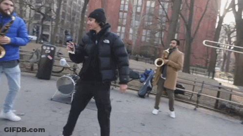 Man Kneeling By Fresh Coffee Sign GIF
