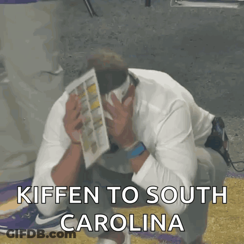 Man Kneeling Head In Hands Kiffen To South Carolina GIF