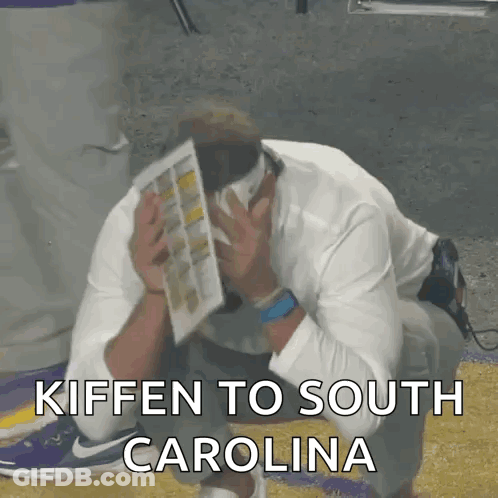 Man Kneeling Head In Hands Kiffen To South Carolina GIF