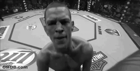 Man Kneeling In Boxing Ring GIF