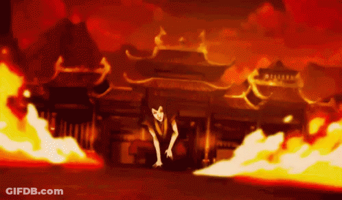 Man Kneeling In Front Of Burning Building GIF