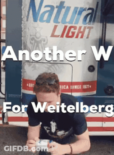 Man Kneeling In Front Of Natural Light Can GIF