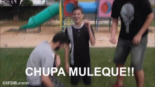 Man Kneeling In Front Of Playground Chupa Muleque GIF