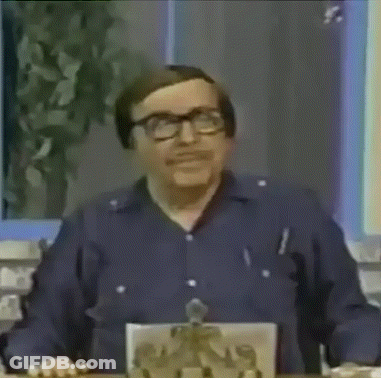 Man Kneeling In Front Of Red Box Number 1 GIF