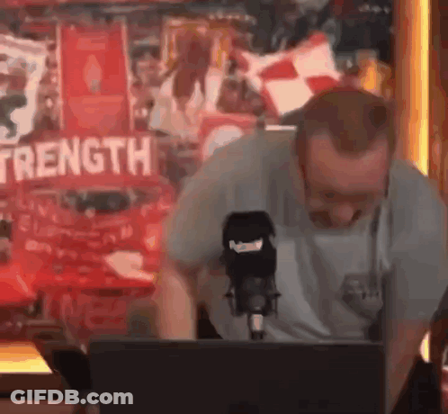 Man Kneeling In Front Of Strength Sign GIF