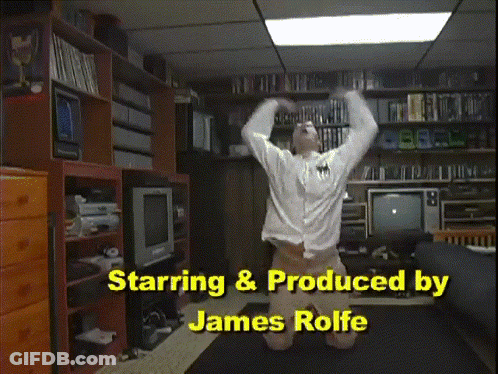 Man Kneeling In Living Room GIF