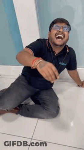 Man Kneeling Laughing Making Funny Face GIF