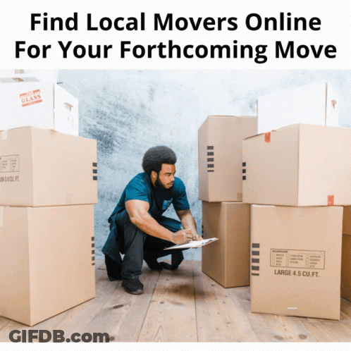 Man Kneeling Near Cardboard Boxes GIF