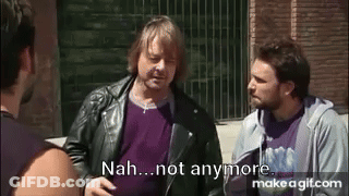 Man Kneeling Next To Another Man In Blue Jeans GIF