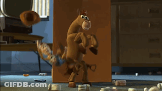 Man Kneeling Next To Buzz Lightyear And Woody GIF