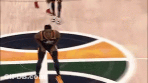 Man Kneeling On Basketball Court GIF