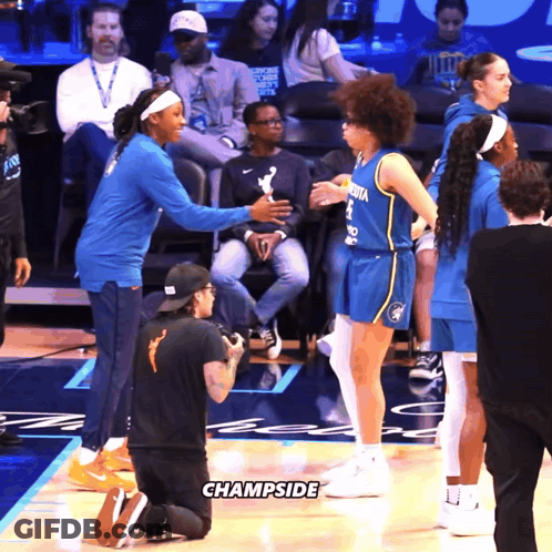 Man Kneeling On Court Champside GIF