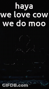 Man Kneeling On Stage With Moo Words GIF