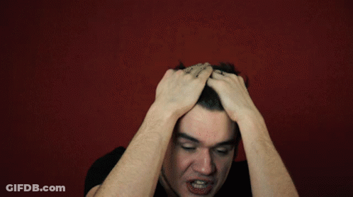 Man Kneeling Please Stand By Red Letters GIF