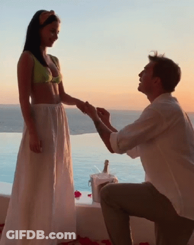 Man Kneeling Proposing To Woman GIF