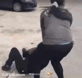 Man Kneeling While Another Man Holds Him GIF