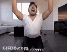 Man Kneeling With Arms Up Saying I'm Sorry GIF