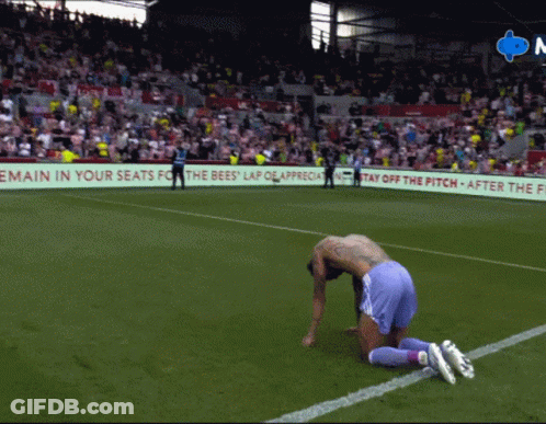 Man Kneeling With Remain In Your Seats Sign GIF