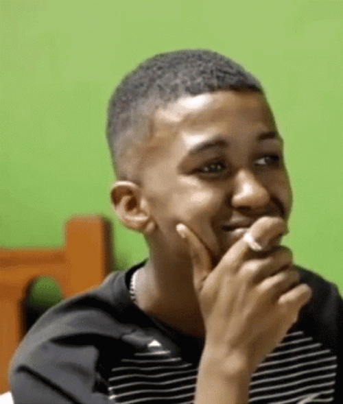 Man Laughing At Something On The Screen GIF