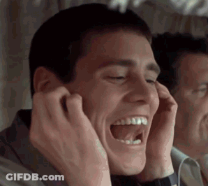 Man Laughing Covering Ears In Mirror GIF