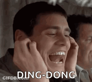 Man Laughing Covering Ears Looking In Mirror GIF