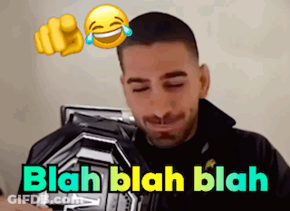 Man Laughing Holding Plaque Saying Blah GIF