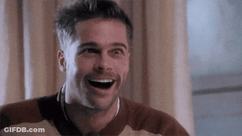 Man Laughing In Brown And White Sweater GIF