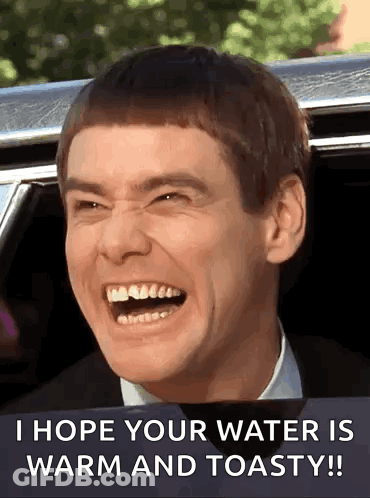 Man Laughing In Car Saying I Hope Your Water Is Warm And Toasty GIF
