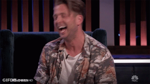 Man Laughing In Chair On NBC GIF