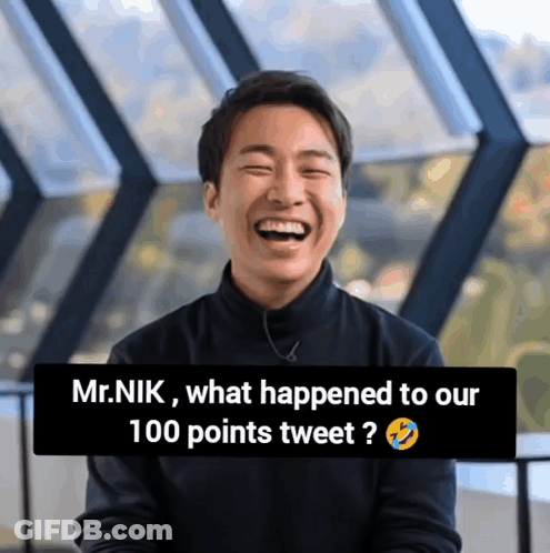 Man Laughing In Front Of Mr. Nik What Happened To Our 100 Points Tweet Sign GIF
